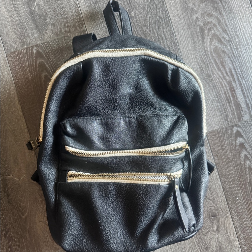 Steve Madden Black Leather Backpack with Gold Accents